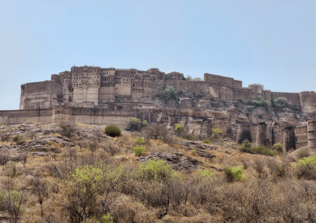 View of Mehrangarh Fort from the Rao Jodha Desert Rock Park trail. It is one of the sites you can visit within 24 hours in Jodhpur.