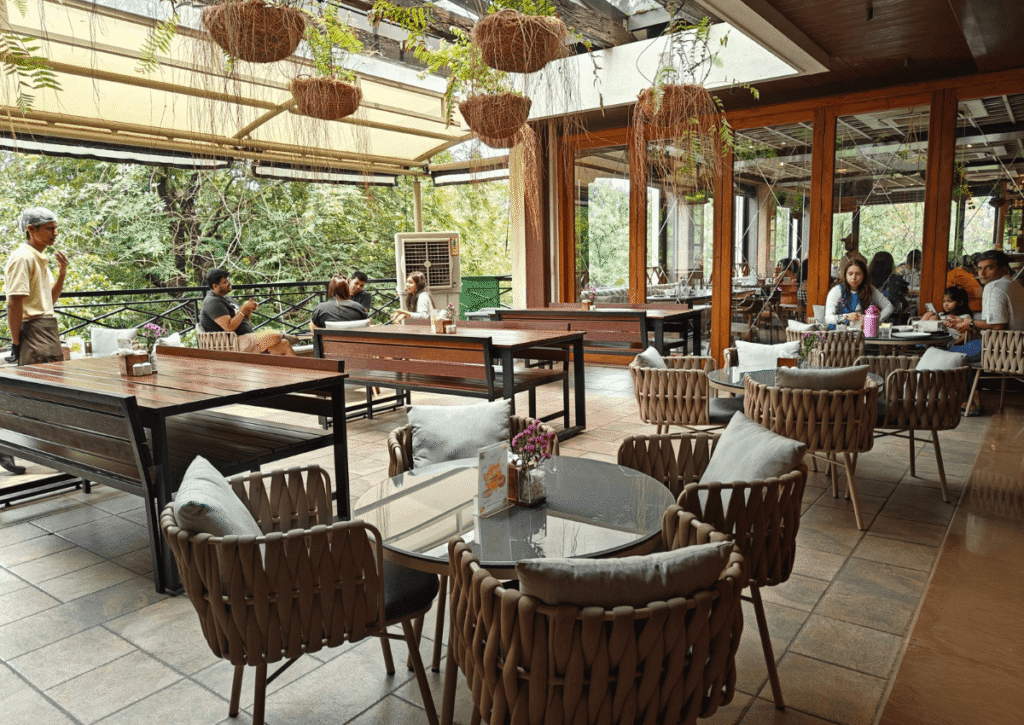 Outdoor seating at Markaiz, a must-visit restaurant during your 1-day road trip to Lonavala.