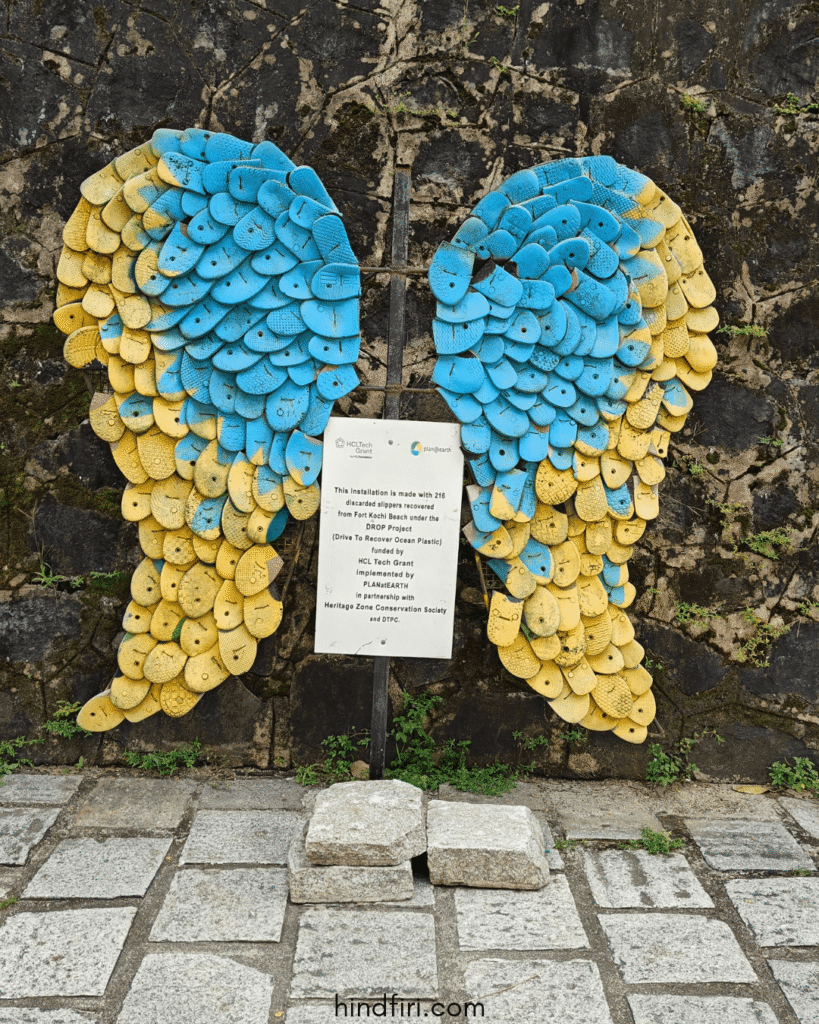The art installation made of slippers at Fort Kochi Beach.