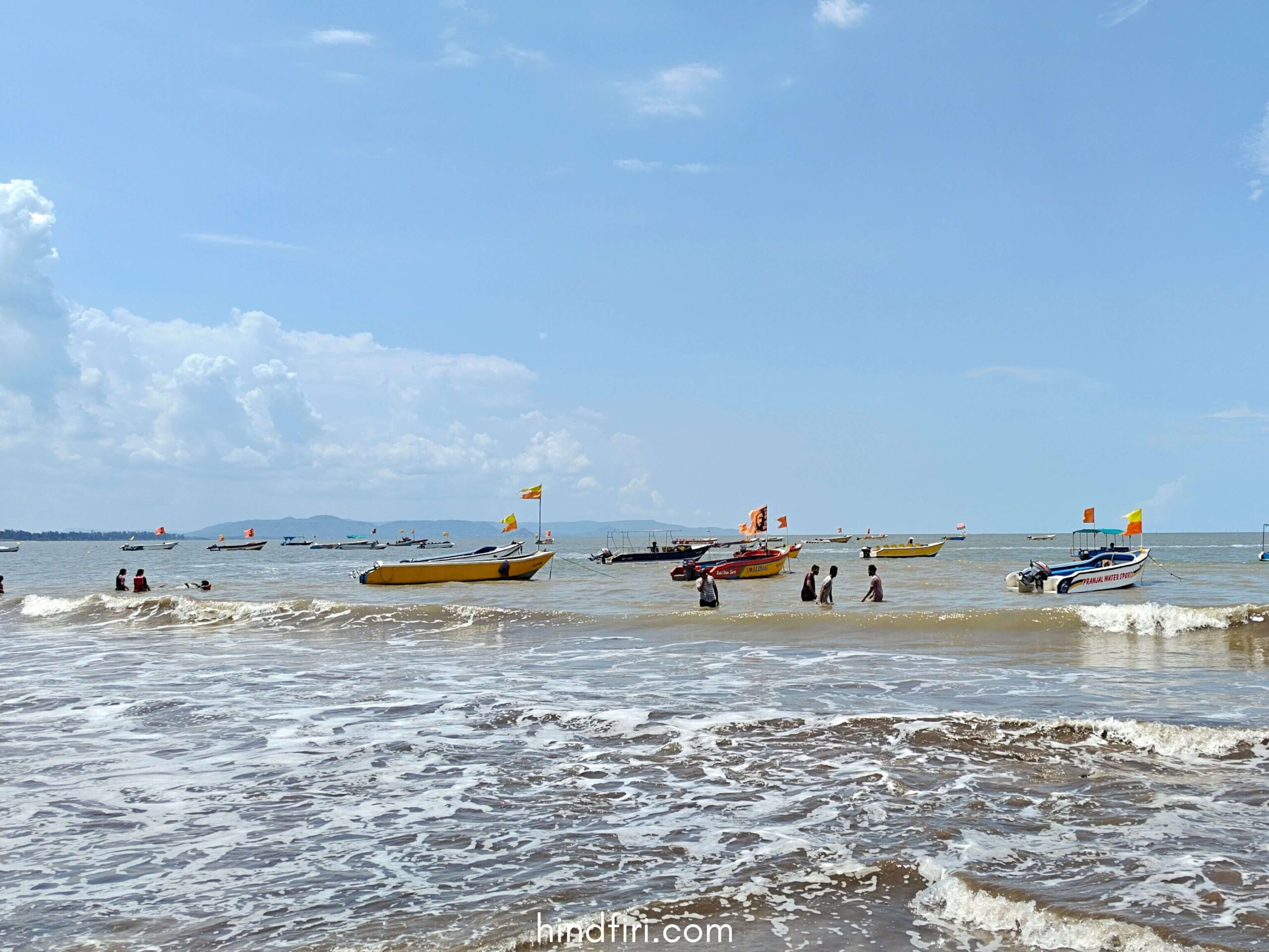 Colourful boats swaying in the sea at Alibaug Beach.
Alibaug travel guide