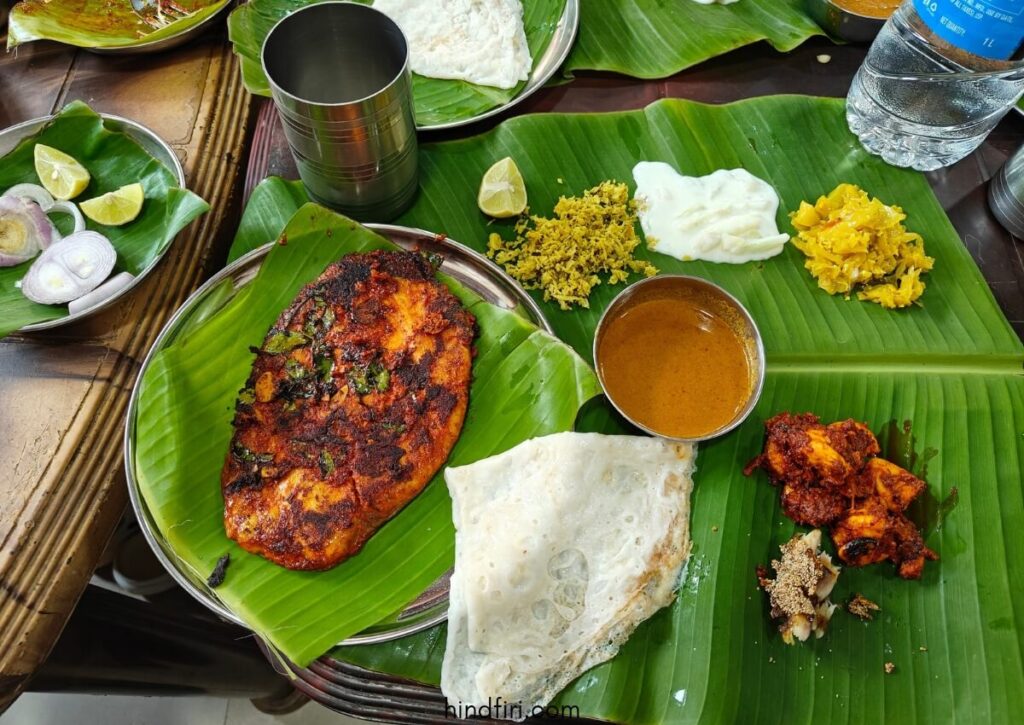 Fish thali and neer dosa at hotel Sai fish land in Udupi. Include it in your 6-day Udupi itinerary 